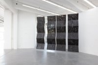 <p><em>Untitled (Weedblock)</em>, 2014<br />
PVC (weedblock), steel ropes<br />
variable dimensions<br />
Kunsthaus Baselland, CH<br />
Image: Sylvain Baumann</p>